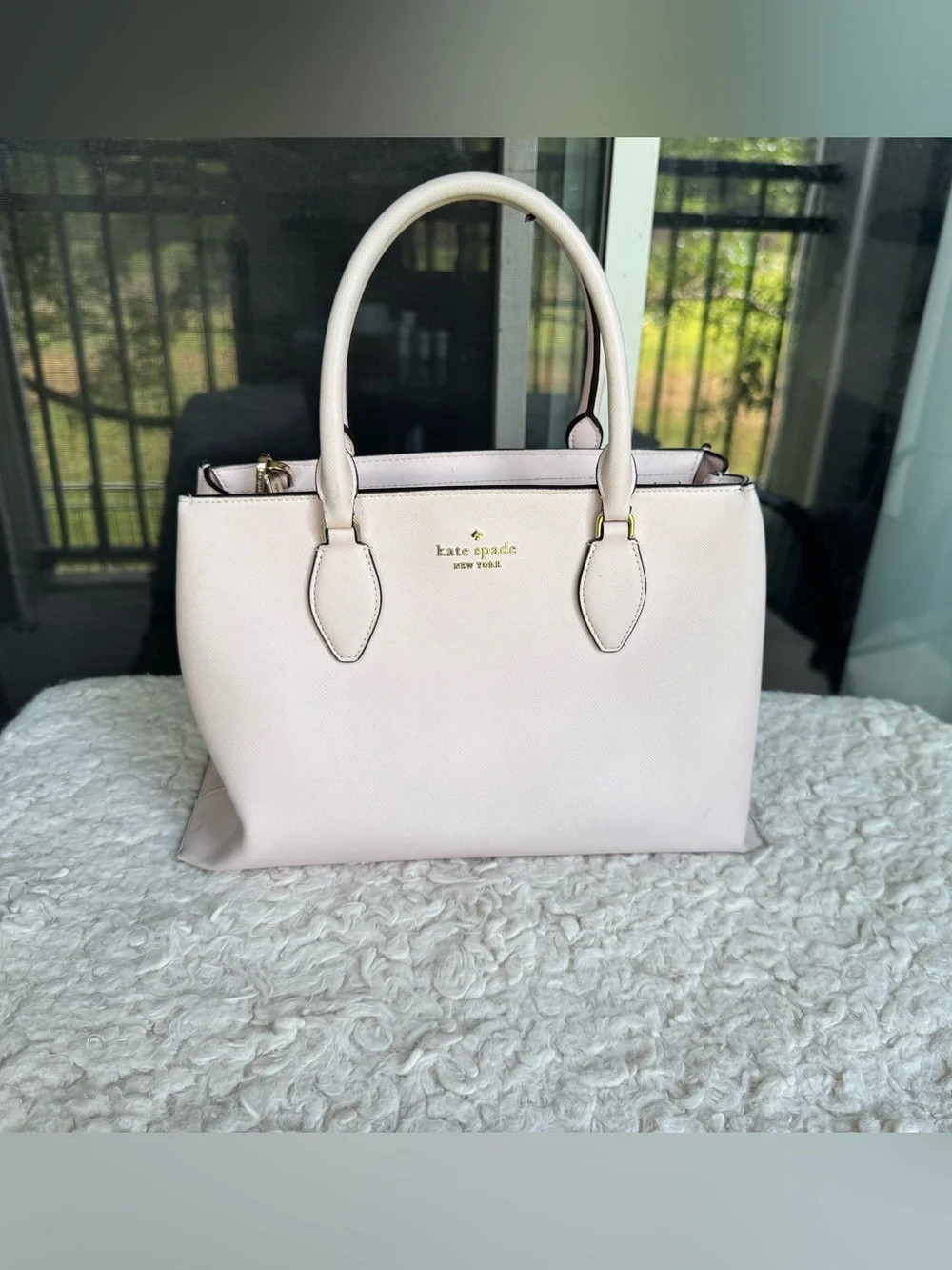 kate spade cream satchel with black trim